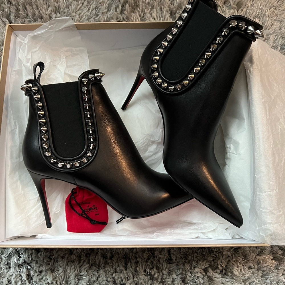 Beautiful Authentic Christian LOUBOUTIN ankle boots.